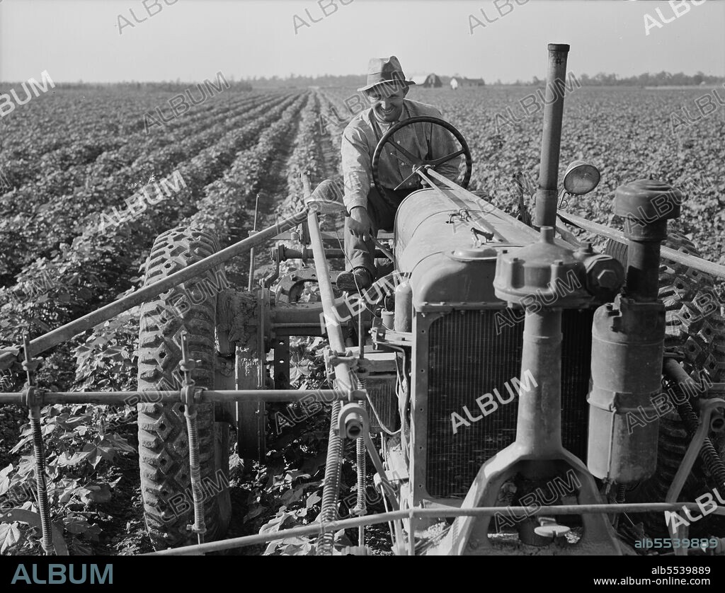 DOROTHEA LANGE. Tractor on Lake Dick project, Arkansas.
