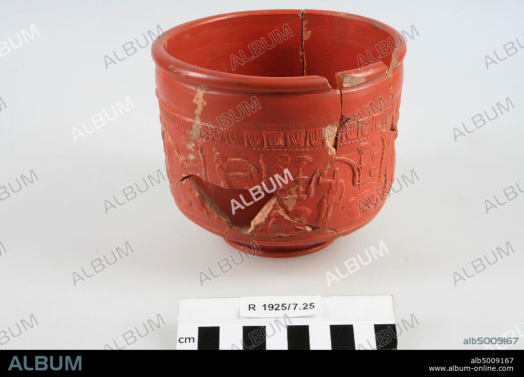 Terra sigillata vase. Consists of several glued shards, several missing shards., Vase, earthenware, terra sigillata, h: 11.3 cm, diam: 13 cm, roman, France.