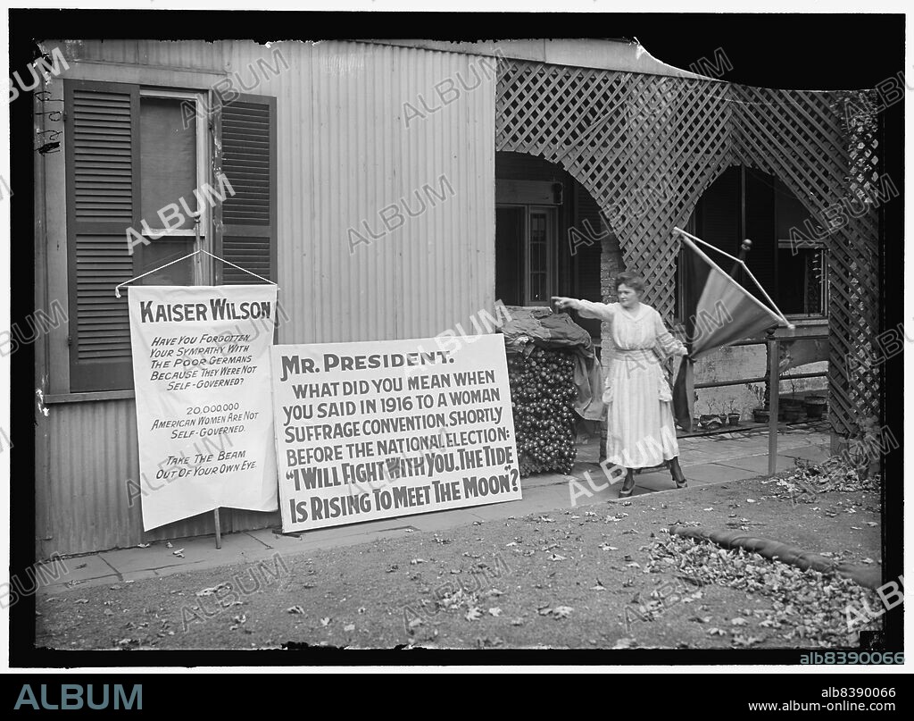 HARRIS & EWING. Woman suffrage banners, between 1916 and 1918. First World War: woman pointing at banners reading: 'Kaiser [Woodrow] Wilson, have you forgotten your sympathy with the poor Germans because they were not self-governed? 20,000,000 American women are not self-governed. Take the beam out of your eye'. 'Mr President, what did you mean when you said in 1916 to a woman suffrage convention, shortly before the national election: "I will fight with you. The tide is rising to meet the Moon"?'. Note pile of banners and poles for demonstrations. Women in the United States gained the legal right to vote in 1920, with the passing of the 19th Amendment.