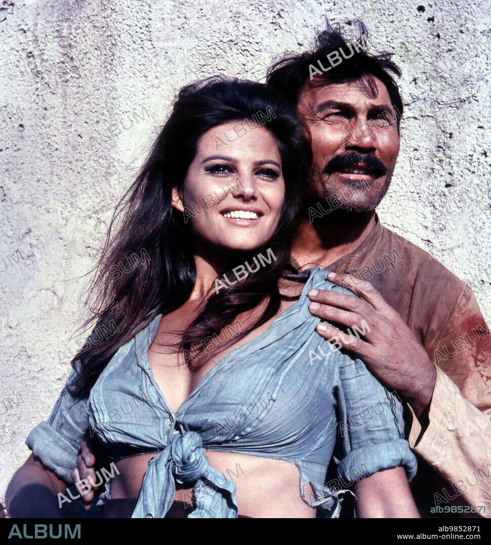 CLAUDIA CARDINALE and JACK PALANCE in THE PROFESSIONALS, 1966, directed by RICHARD BROOKS. Copyright COLUMBIA PICTURES.