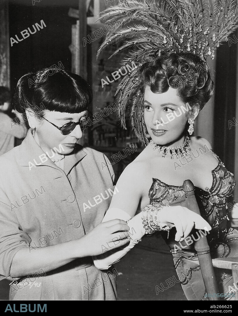 ARLENE DAHL and EDITH HEAD in HERE COME THE GIRLS, 1953, directed by CLAUDE BINYON. Copyright PARAMOUNT PICTURES.