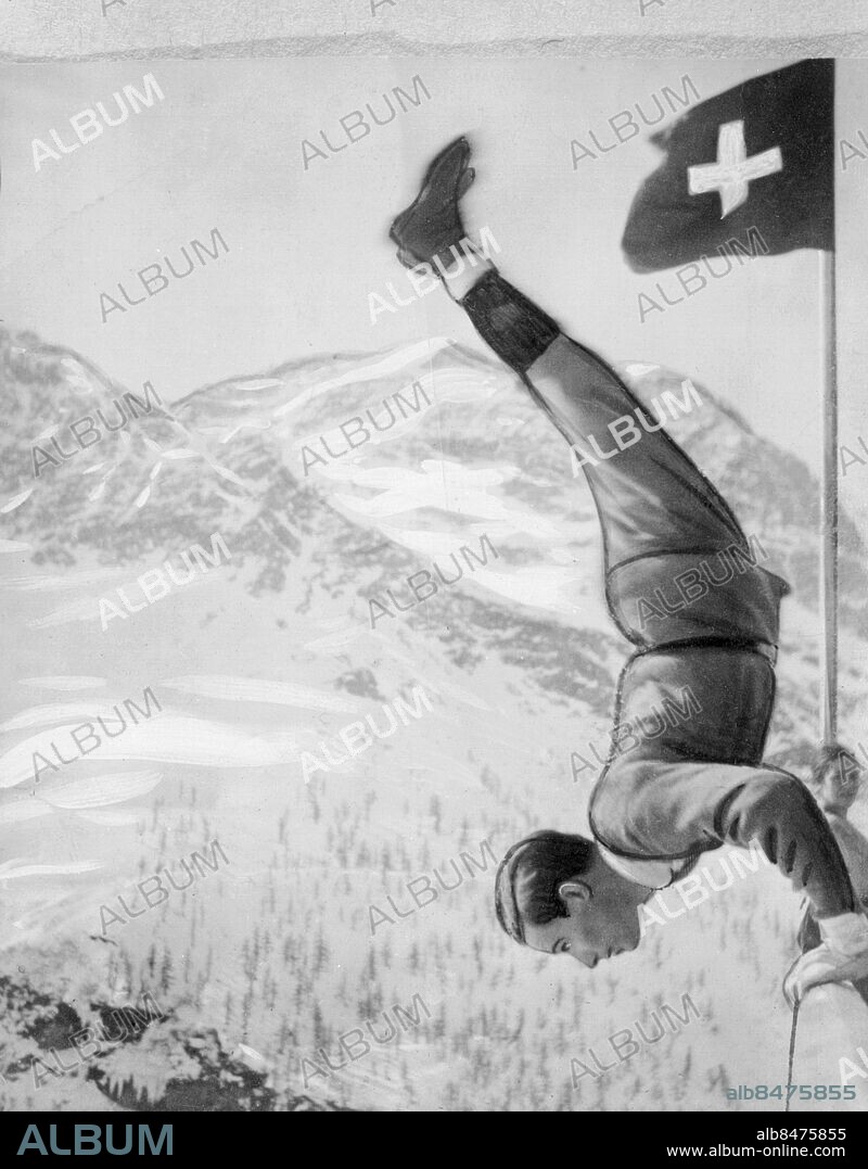 SCHWEIZ OKÄNT FOTODATUM.. Orig. bildtext... GILLIS GRAFSTRÖM - THE MAN WITHOUT NERVES. This remarkable photo was taken by a friend of the famous Swedish skating champion Gillis Grafström, when they were together in Switzerland at an Alpine restaurant, called Alp-Grün, near the famous mountain Piz-Palü, famous for its so called Death Steep. Here the mountain runs downright for 300 Meters and Gillis Grafström is seen here standing on his hands and looking down into the steep canyon. The most remarkable fact was that Gillis Grafström made the feat 3 times. The 3rd time he went down on the other side and hang down right along the mountain only keeping himself at the barrier and afterwards heaving himself up and riding on the barrier. The third time he did this tric only to enable his friend, another Swedish skater to take this photo, showing a real Swedish dare-devil of the old viking stock, for Gillis Grafström is really a true sportsman and may be engaged by a circus or a variety if they only could get him. Not. Dödsstupet vid Piz Palü Berg-Restaurang Alp-Grün vid järnvägslinjen St Moritz Bernina häuser-Tirano, världens högsta järnvägsbana. Anm. G Grafström, 1893-1938, svensk konståkare, tog bl a tre olympiska guldmedaljer. Alper Dödsförakt Orädd Stup Stå på händer Våghalsig CD650 persons: GILLIS GRAFSTRÖM sites: SCHWEIZ;SVERIGE*.