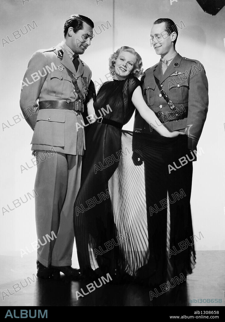 CARY GRANT, FRANCHOT TONE and JEAN HARLOW in SUZY, 1936, directed by GEORGE FITZMAURICE. Copyright M.G.M.