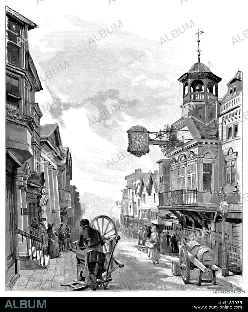 'Guildford: High Street, with the Town Hall', 1886. The Guildhall in Guildford, Surrey, which dates back to the 14th century. The facade was constructed in 1683 and features an iconic projected clock. From The Magazine of Art. [Cassell & Company, London, 1886].