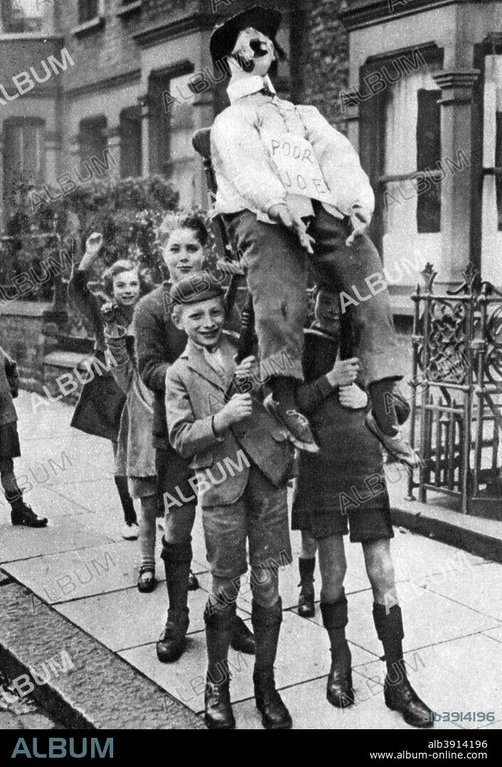 Guy Fawkes Day, London, 1926-1927. Children with a homemade 'guy' collecting money to buy fireworks. Illustration from Wonderful London, edited by Arthur St John Adcock, Volume I, published by Amalgamated Press, (London, 1926-1927).