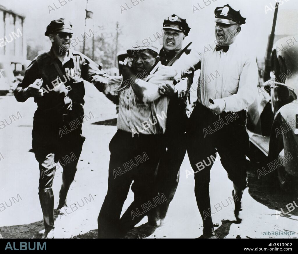 Police assault a striker or strike sympathizer during what is now known as the Memorial Day Massacre. In 1937, Chicago police shot and killed 10 demonstrators supporting a strike by steel workers.