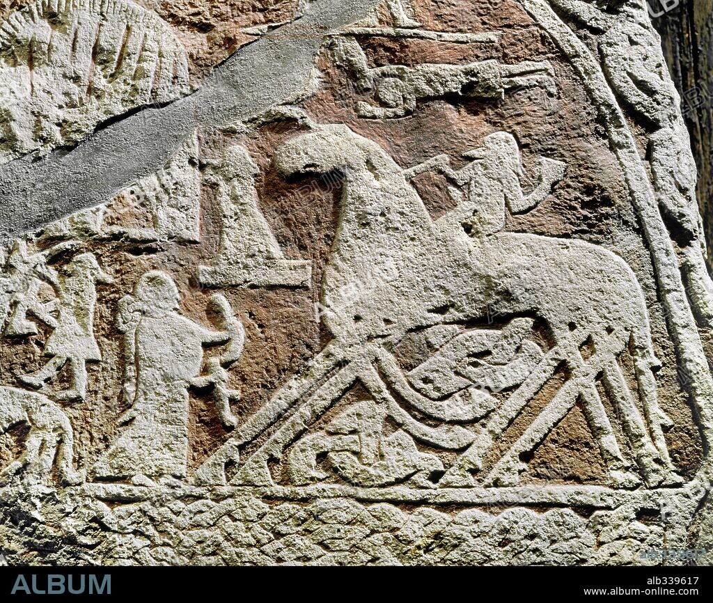 Viking picture stone from Tjangvide Gotland, IXth century showing God Wotan on horse Sleipnir assisted by Walkyrie.