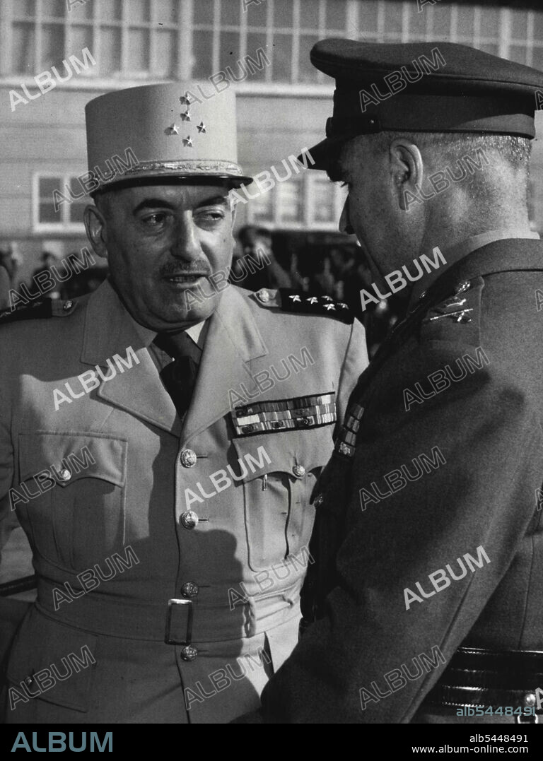 Five-Star General Augustin Guillaume, Chief of the French General Staff, welcomed by his Australian counterpart, Lieut-General H. Wells, at Essendon today. He is already known as General "Bill" by Australian officers. July 11, 1955.