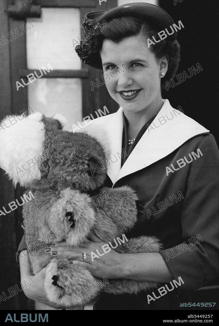 A Gist From Australia Mrs. Robin Byrne, Daughter of General sir Dallas Brooks, Governor of Victoria, Australia, Holds a Toy koala bear Presented to the Governor by members of both houses of the Victorian Parliament and their wives as a Gift to his Grandson. The Picture was made at Tilbury, near London, today August 9 after Mrs, Byrne had Greeted Her Parents on their arrival aboard the liner Stratheden for a holiday in England. August 9, 1953. (Photo by Associated Press).