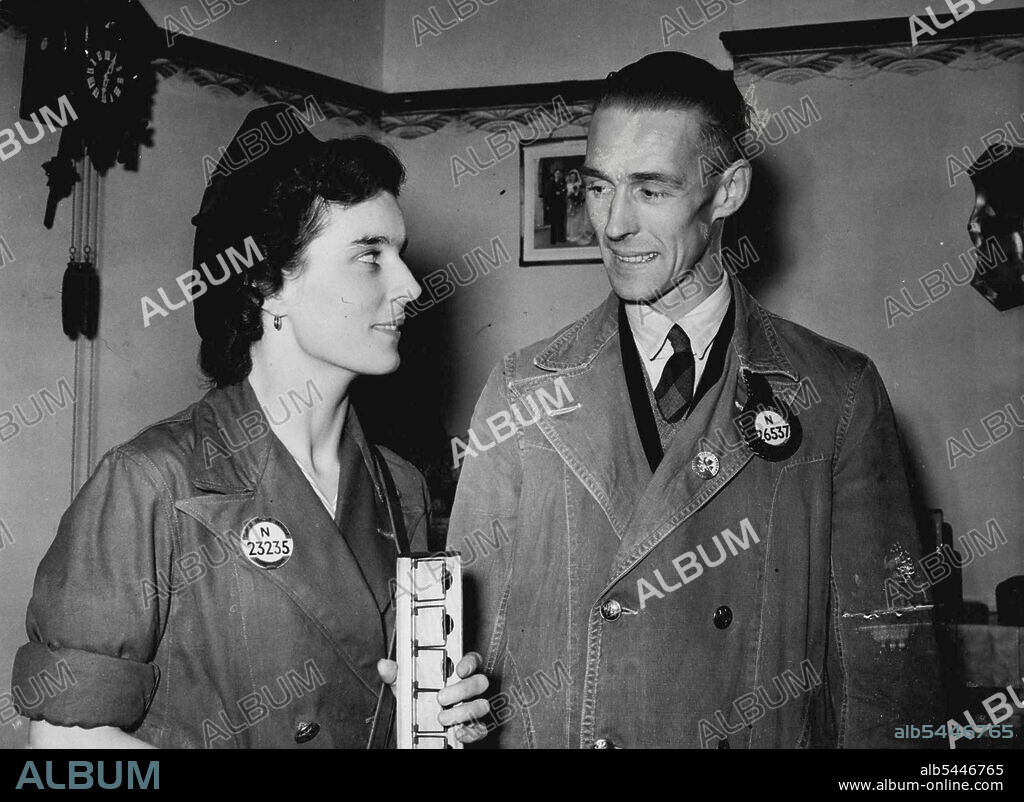 Nancy and Ron Defy Their Mates - Clippie Nancy Pritchard - Driven Ron Ewell. When Ron Ewell, 34-year-old London bus driver, was a prisoner of war in Germany, the Nazi officers used to call him "Tolpel." They meant the awkward one. They knew that if Ron thought he was right they could beat him, put him in jail, and do what they would with him, but they couldn't change his mind. Yesterday 650 London busmen went on strike because Ron refuses to stop driving with 26-year-old Nancy Pritchard, his conductress. September 27, 1950.