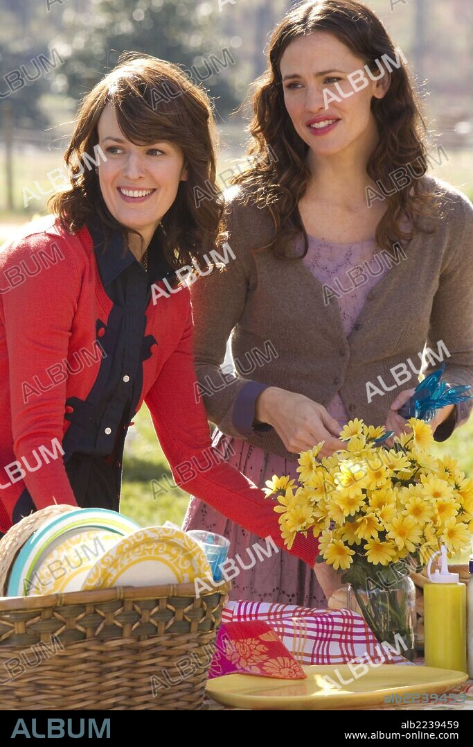 JENNIFER GARNER and ROSEMARIE DEWITT in THE ODD LIFE OF TIMOTHY GREEN, 2012, directed by PETER HEDGES. Copyright WALT DISNEY PICTURES.