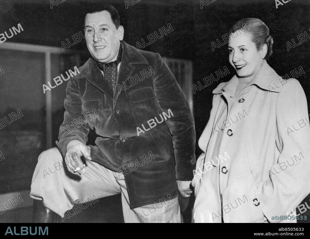 Orig. bildtext... REVOLT THREATENS THEIR RULE IN ARGENTINA President Juan Peron and his wife, Evita, were riding high, wide and handsome when this photo was made a short time ago, shortly before they agreed to run for president and vice-president For the happiness of the people. Evita later withdrew to pacify disgruntled army heads. Today the army is reported in revolt against the Peron Government and president Peron has declared A state of internal war throughout the Nation. One statement said that all members of the armed forces who rise against the Government will be shot. CD27 persons: EVA EVITA PERON;JUAN PERON sites: SYDAMERIKA;ARGENTINA;BUENOS AIRES.