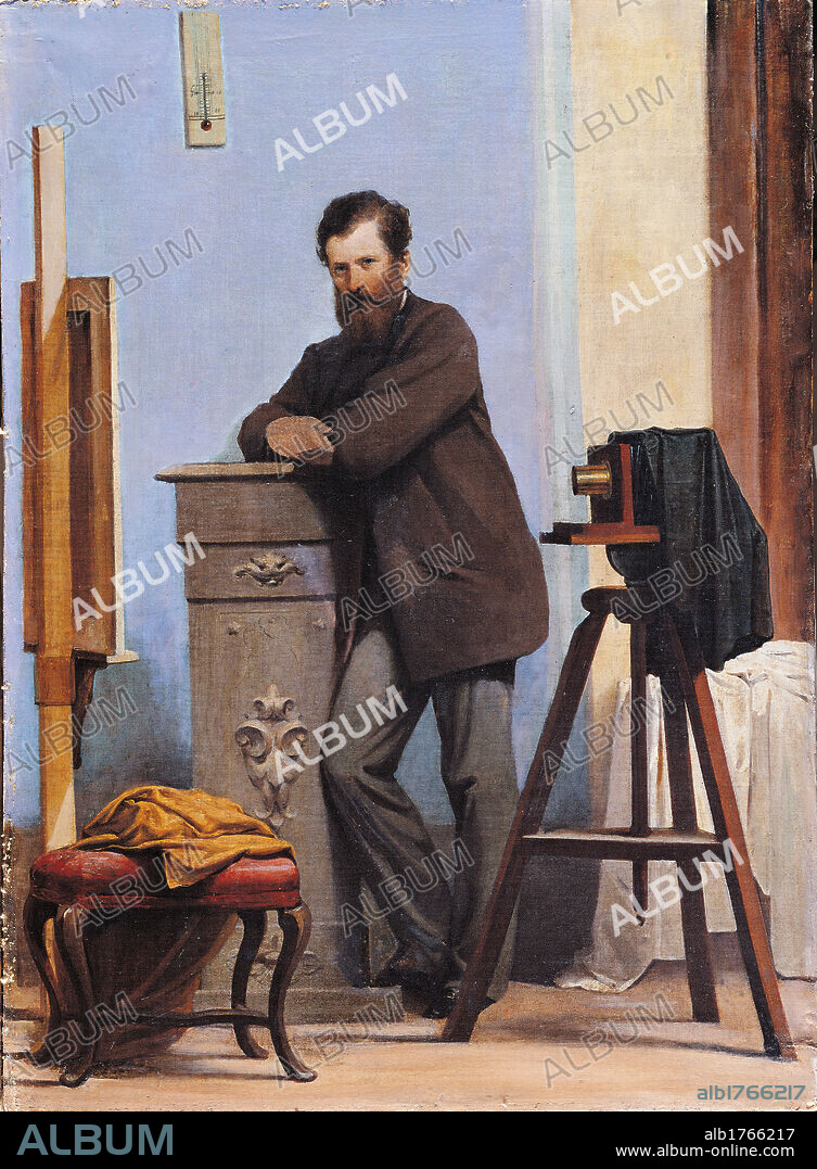Self portrait with Camera, by Alessandro Guardassoni, 1860, 19th Century, oil on canvas,. Italy, Emilia Romagna, Bologna, Gualandi Institute. All. Whole figure portrait of man atelier camera tripod stool wall light blue azure man beard self portrait Alessandro Guardassoni.