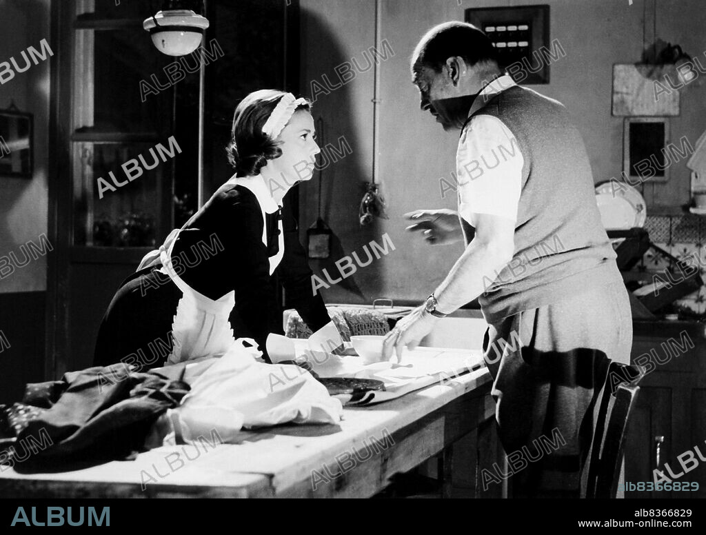 JEANNE MOREAU and LUIS BUÑUEL in DIARY OF A CHAMBERMAID, 1964 (LE JOURNAL D'UNE FEMME DE CHAMBRE), directed by LUIS BUÑUEL. Copyright SPEVA/CINE ALLIANCE/FILM SONOR/DEAR.