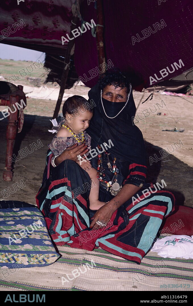 Rashaida woman and baby near Suakin, Sudan, Africa.