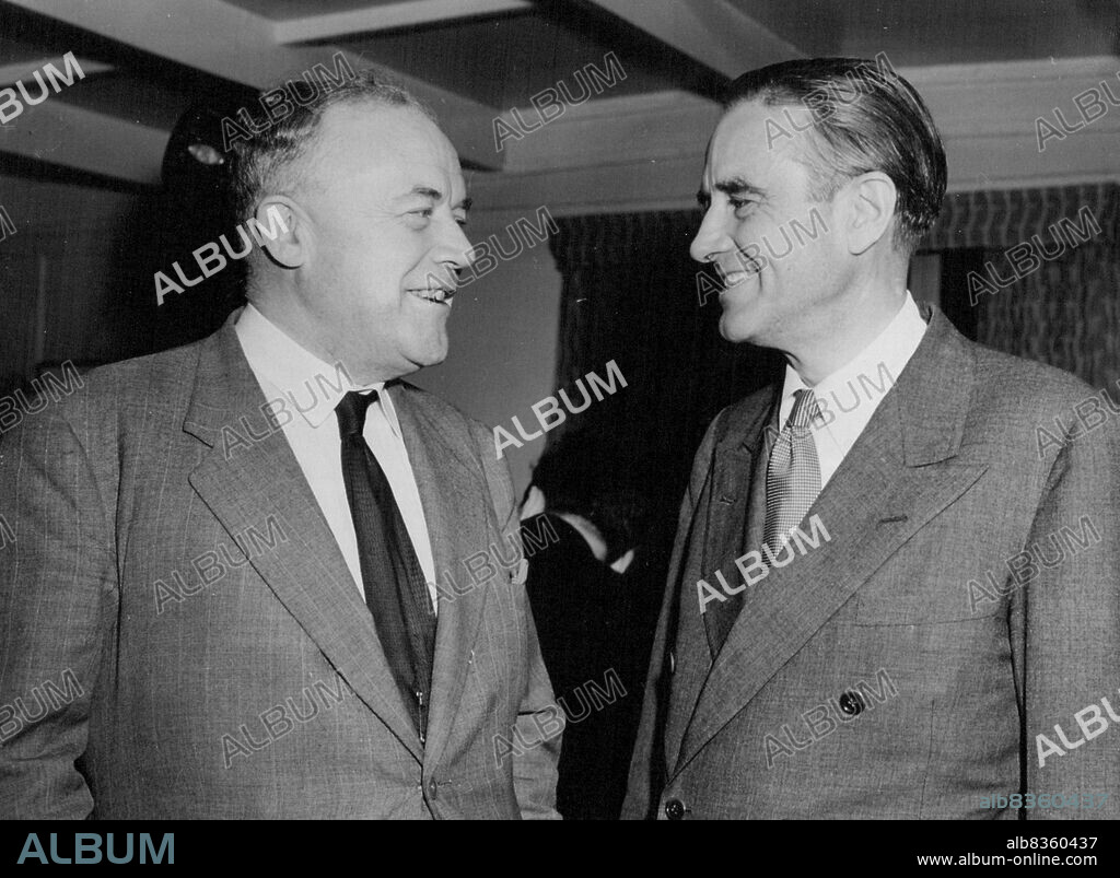 Mr. Stokes Meets Mr. Harriman At London Airport American Envoy Flies From Persia -- Mr. Richard Stokes the Lord Privy Seal seen as he greets Mr. Averell Harriman the United States Envoy - on the latter's arrival at London Airport last evening from Persia.. He and Mr. Harriman are to have consultations with Foreign Office Chiefs and Anglo - Iranian Oil Company officials today. August 27, 1951. (Photo by Daily Mail Contract Picture).
