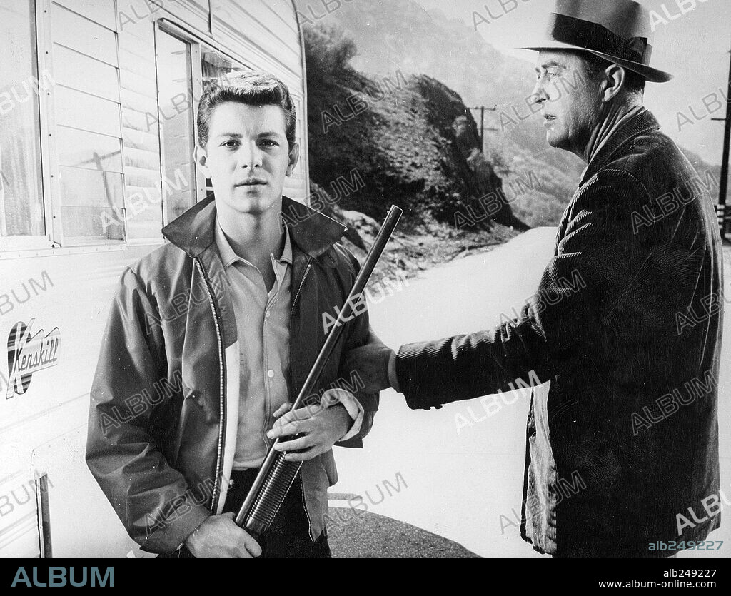 FRANKIE AVALON and RAY MILLAND in PANIC IN YEAR ZERO!, 1962, directed by RAY MILLAND. Copyright AMERICAN INTERNATIONAL PICTURES.