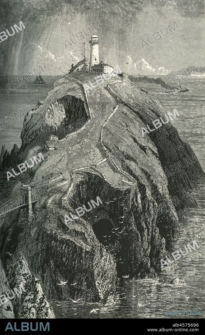 'South Stack Lighthouse, Holyhead', c1870. South Stack Lighthouse on a small island on the coast of Holy Island, Anglesey, Wales built in 1809 by Daniel Asher Alexander to warn ships on the Irish sea. From "Picturesque Europe - The British Isles, Vol. II". [Cassell, Petter & Galpin, London, c1870].