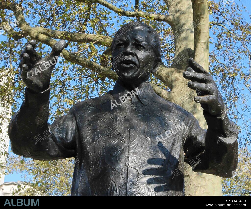 Bronze sculpture of Nelson Mandela in Parliament Square, London. Nelson Mandela was a former President of South Africa and anti-apartheid activist. Originally proposed to Mandela by Donald Woods in 2001, a fund was set up and led by Woods's wife and Lord Richard Attenborough after the death of Woods.