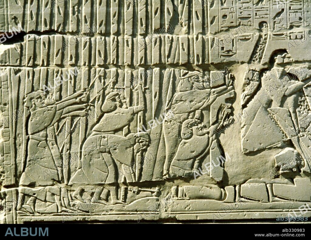 Relief of Battle of Kadesh showing Pharaoh Rameses II in chariot fighting Hittite enemy of King Muwatallis, 1294 BC. Karnak Luxor Egypt.