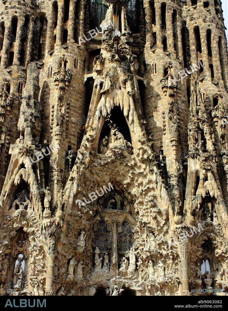 The Basilica I Temple Expiatori de la Sagrada Familia (Sagrada Familia). The very large Roman Catholic church was designed by Catalan architect Antoni Gaudi in a Spanish gothic style architecture as well as incorporating modernism, noucentisme and art nouveau. Although construction began in 1882 it was finally opened November 2010. Barcelona. Spain 2013.