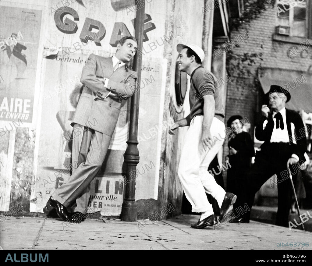 GENE KELLY and GEORGES GUETARY in AN AMERICAN IN PARIS, 1951, directed by VINCENTE MINNELLI. Copyright M.G.M.