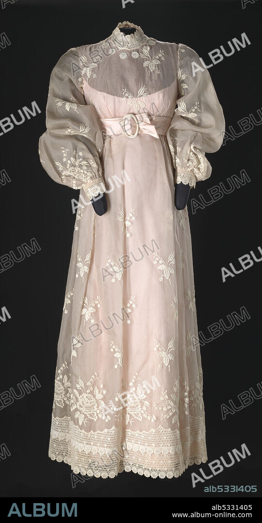 Dress worn by Diahann Carroll as the character Julia Baker on the television show "Julia." The pink and cream dress is a full-length, long-sleeved gown with a high neck. African-American actress, singer, model, and activist Diahann Carroll (1935-2019) rose to prominence in some of the earliest major studio films to feature black casts, including Carmen Jones (1954) and Porgy and Bess (1959).