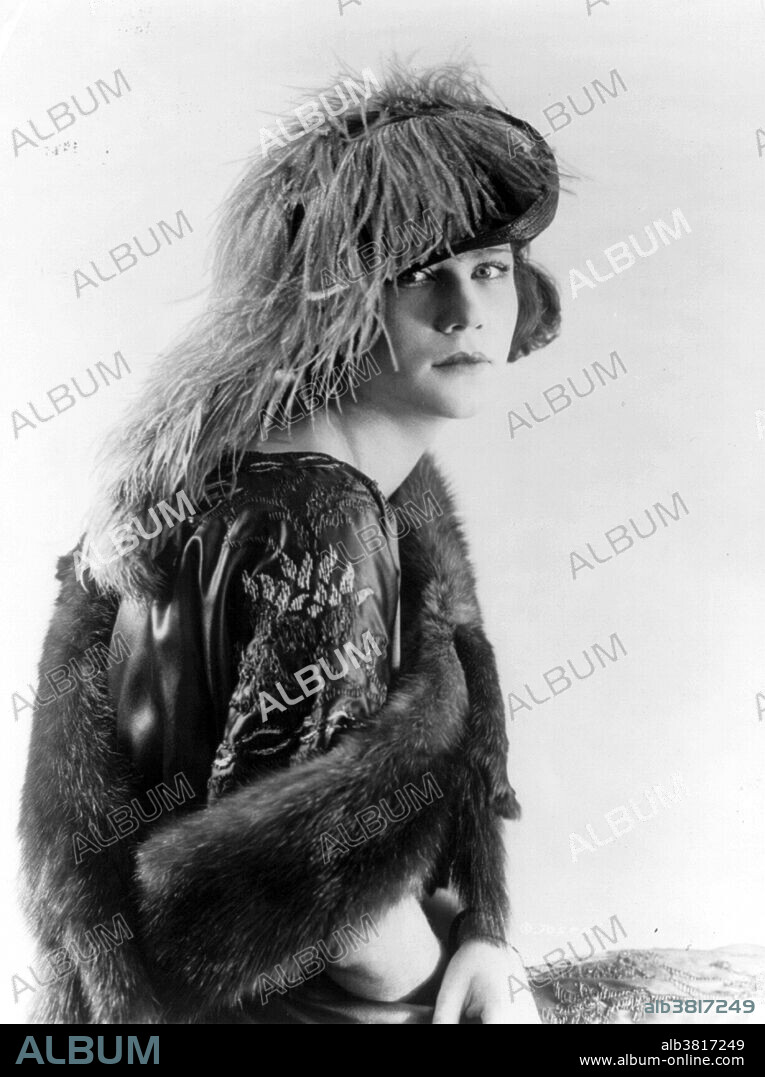 Woman modeling dress, fur stole, and feathered hat. Fashion is a popular style or practice, especially in clothing, footwear, accessories, makeup, or furniture. Fashion is a distinctive and often habitual trend in the style in which a person dresses. It is the prevailing styles in behavior and the newest creations of textile designers. Prior to the mid-19th century, most clothing was custom-made. It was handmade for individuals, either as home production or on order from dressmakers and tailors. By the beginning of the 20th century, with the rise of new technologies such as the sewing machine, the development of the factory system of production, and the emergence of department stores, clothing had increasingly come to be mass-produced in standard sizes and sold at fixed prices.