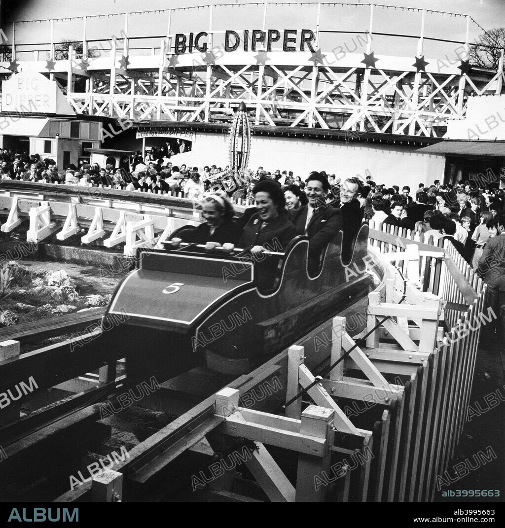 Fun on the Big Dipper at Battersea Funfair, London, 1966.