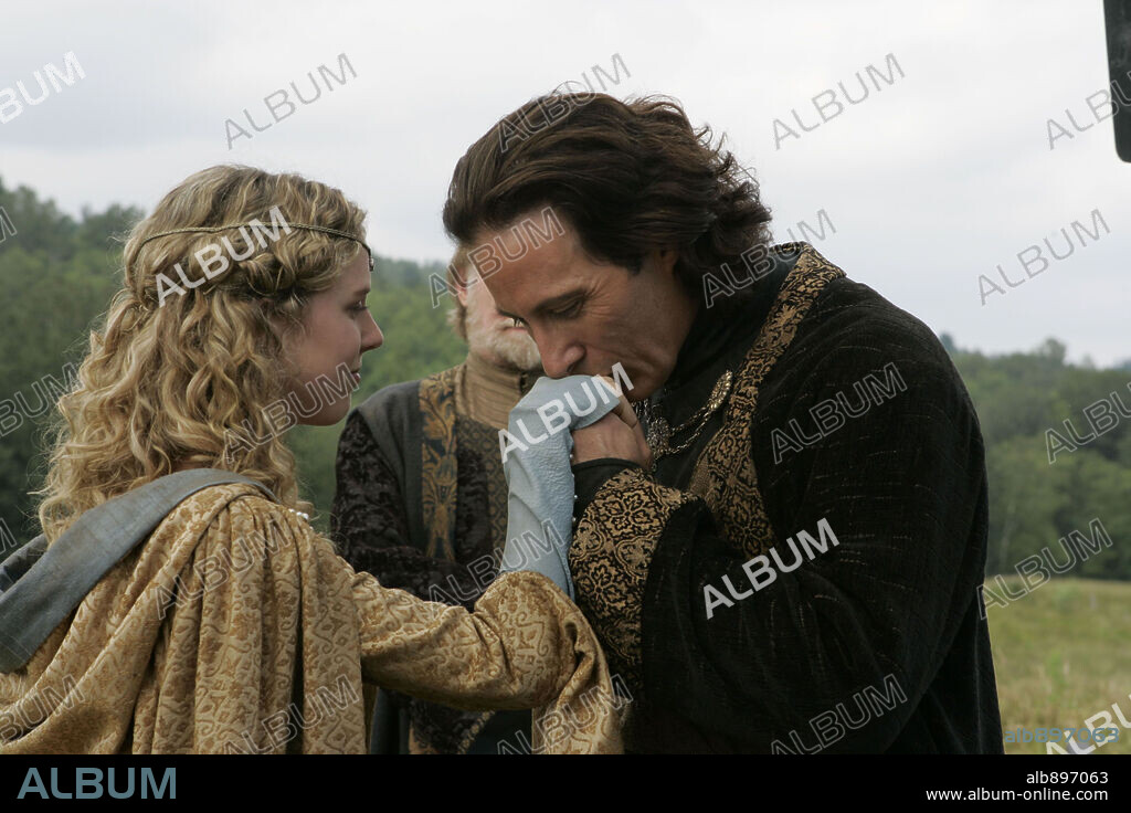 GARWIN SANFORD and TEGAN MOSS in MERLIN'S APPRENTICE, 2006 (MERLIN'S APPRENTICE-TV), directed by DAVID WU. Copyright HALLMARK.