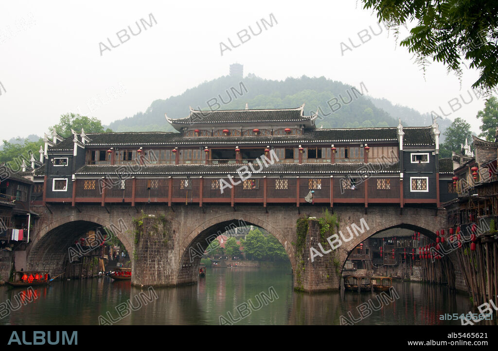 Fenghuang is Chinese for Phoenix and refers to the mythical sacred firebird that can be found in the mythologies of the Persians, Greeks, Romans, Egyptians, Chinese, and (according to Sanchuniathon) the Phoenicians. Legend suggests that two phoenixes on discovering the town hovered overhead for some considerable time before reluctantly flying away. Fenghuang town is a well-preserved ancient town supposedly dating back to 248 BC. It is home to the Miao and Tujia minorities. The distinctive architecture includes Ming and Qing styles.