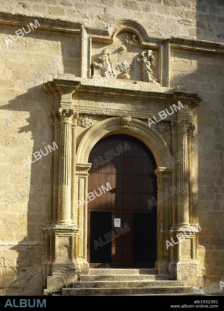 Spain, Andalusia, Granada province, Montefrío. Iglesia de la Villa (Church of la Villa). Detail of the doorway of the church, built in 1507 in late Gothic style with Renaissance elements. A relief on the front of the door depicts a scene of the Incarnation.
