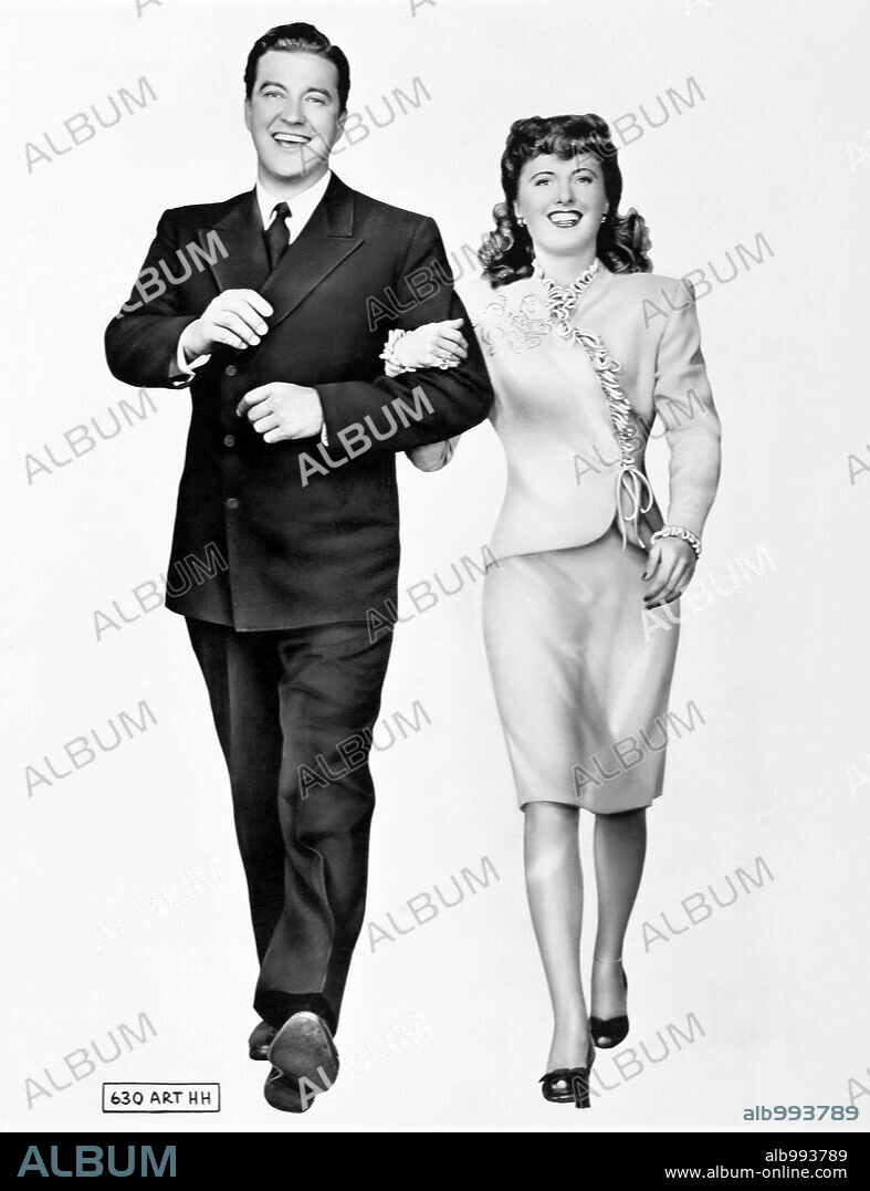 BARBARA STANWYCK and DENNIS MORGAN in CHRISTMAS IN CONNECTICUT, 1945, directed by PETER GODFREY. Copyright UNIVERSAL PICTURES.