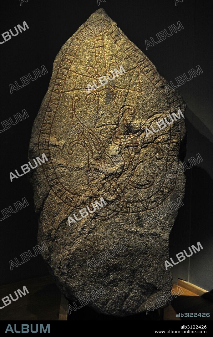 Unna's Rune Stone. Christian cross and serpent with rune writing. Torsatra, Uppland. Historical Museum. Stockholm. Sweden.