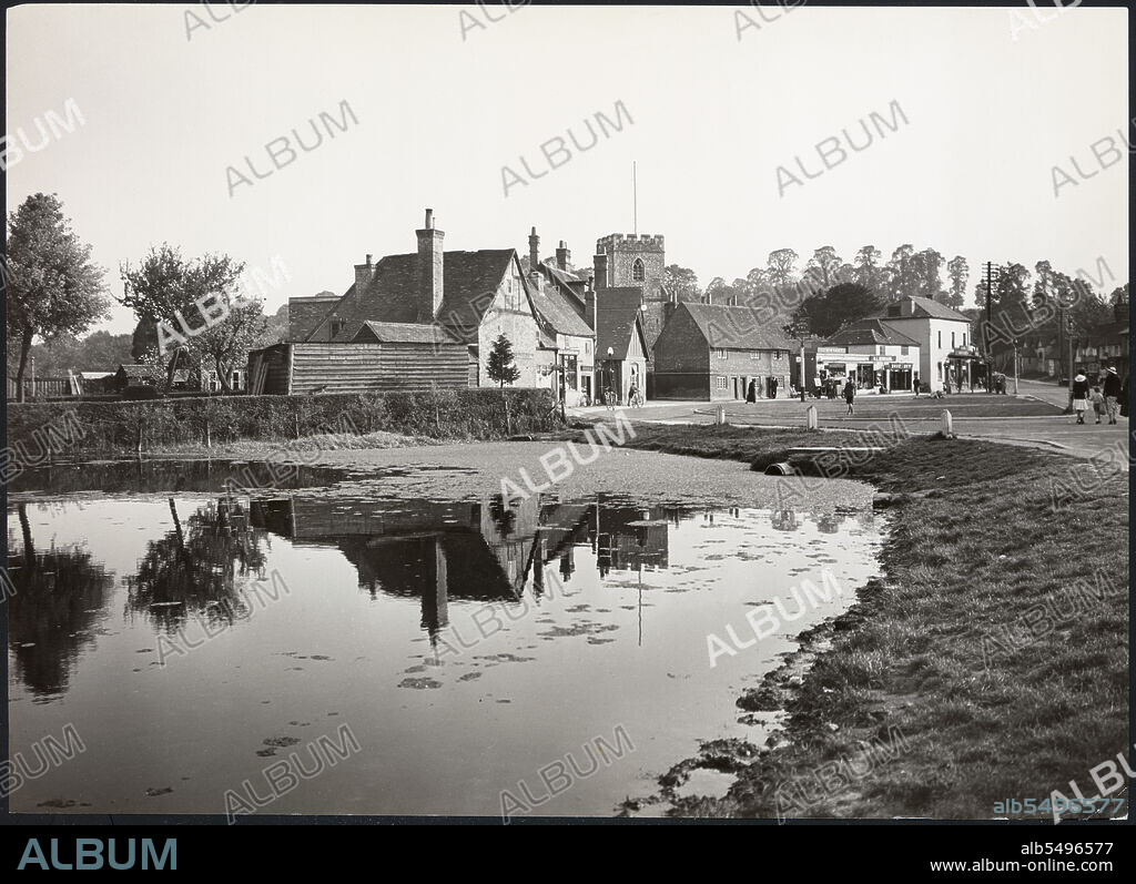 J DIXON SCOTT. The Green, Chalfont St Giles, Chiltern, Buckinghamshire, 1925-1935. A view looking across the village pond towards buildings on The Green and St Giles's Church.