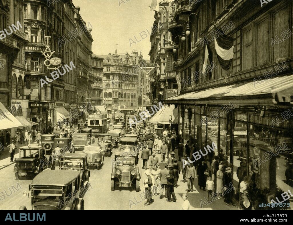 Kärntner Straße, Vienna, Austria, c1935. Kärntner Straße (Carinthian Street) is a famous shopping street in central Vienna. It dates back to at least the 13th century when the Strata Carintianorum was a trade route to the southern province of Carinthia. From "Österreich - Land Und Volk", (Austria, Land and People). [R. Lechner (Wilhelm Müller), Vienna, c1935].