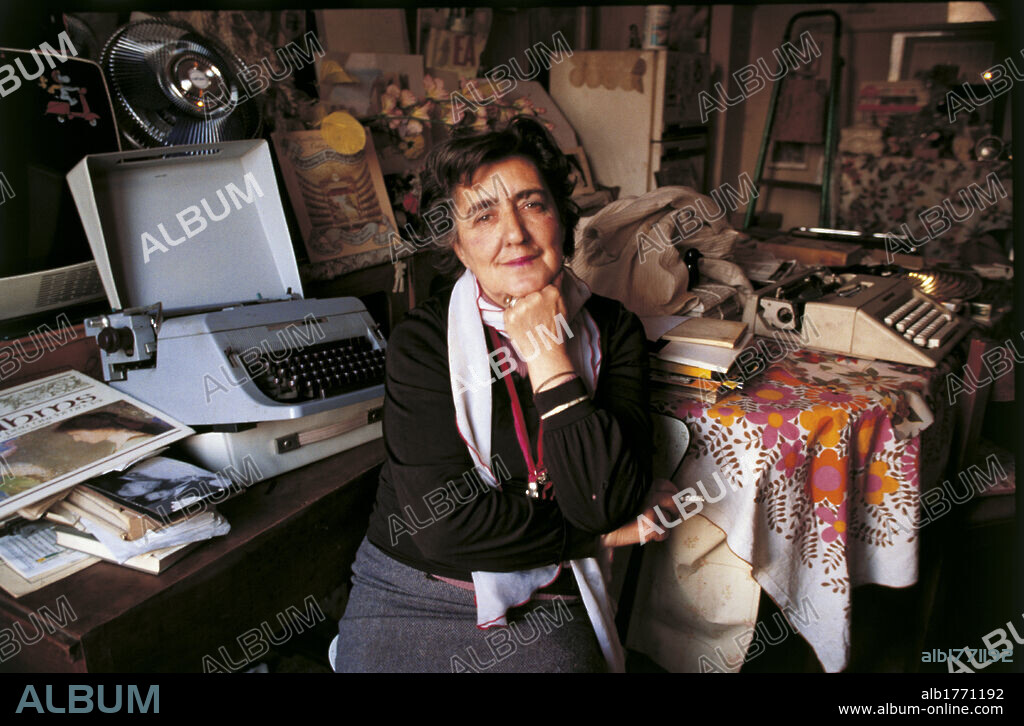 Portrait of Alda Merini at the writing desk. Portrait of Italian writer Alda Merini at her desk. 1980s.