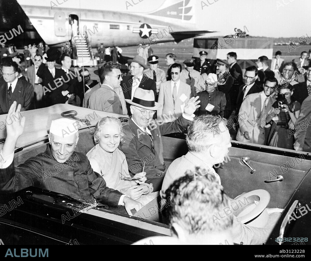 Photograph of President Harry S. Truman (1884-1972) and Indian Prime Minister Jawaharlal Nehru (1889-1964) along with Nehru's sister, Madame Pandit. Photographed by Abbie Rowe (1905-1967). Dated 1949.