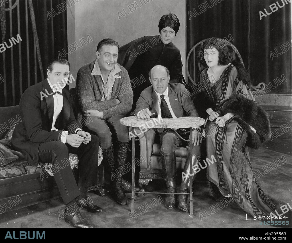 CECIL B DEMILLE, ELLIOTT DEXTER and GLORIA SWANSON in THE AFFAIRS OF ANATOL, 1921, directed by CECIL B DEMILLE. Copyright PARAMOUNT PICTURES.