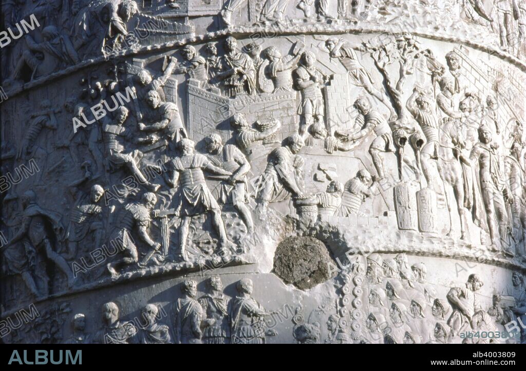 Roman soldiers building a fort in the Dacian campaign, Trajan's Column, Rome, c2nd century. Triumphal column in Rome, Italy, commemorating Roman emperor Trajan's victory in the Dacian Wars. Completed in AD 113. The first five scenes on the Column of Trajan depict Roman soldiers in construction.