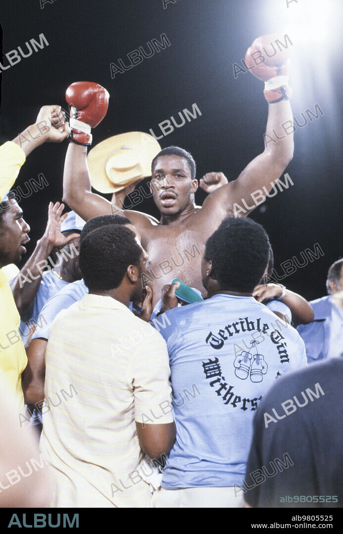 Larry Holmes wins against Witherspoon, the 80s.