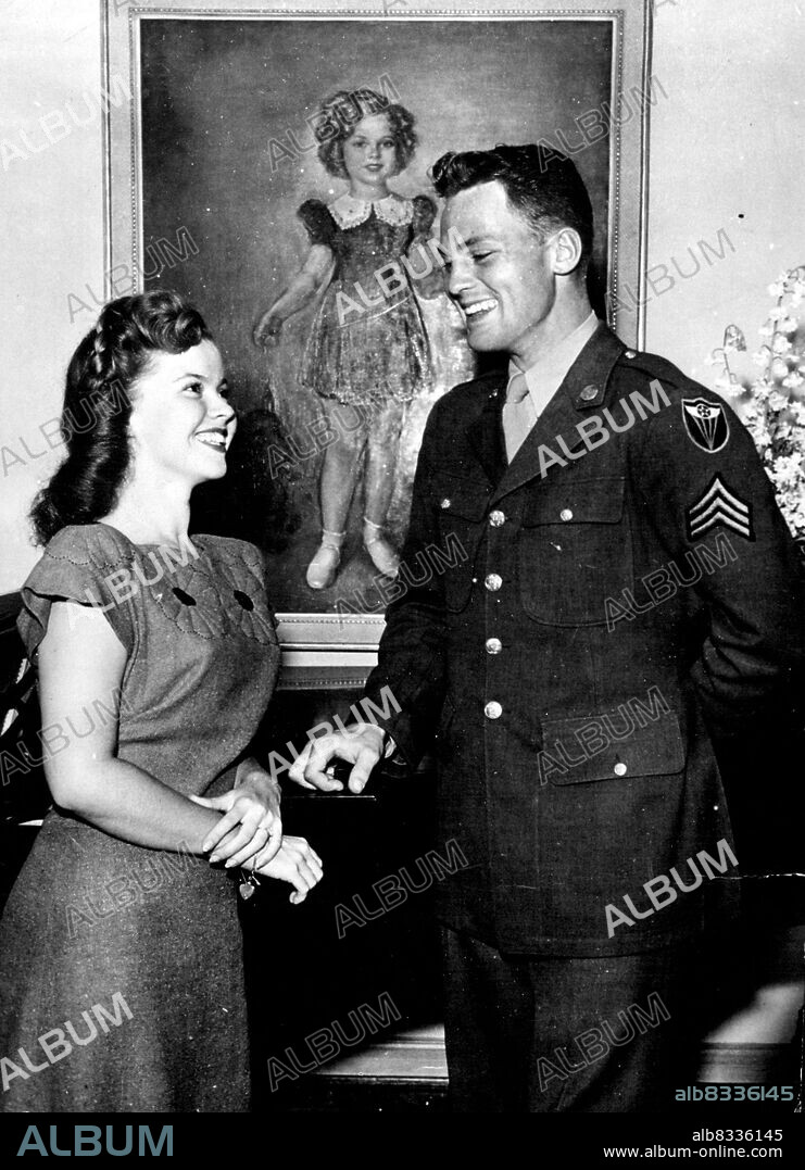 Shirley Black (Temple) - Actress - With First Husband John Agar & Wedding Photos And Baby - Personalities. June 4, 1945. (Photo by U.S. Office Of War Information Picture).