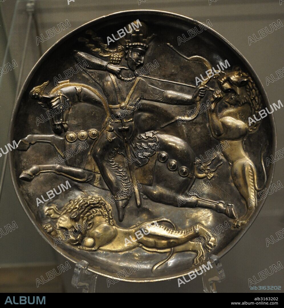 Sasanian Empire. King Shapur II (Reigh 309-379). Plate with Shapur II on a Lion Hunt. Silver; chasing, gilding. Iran. 4th century. Found as a part a treasure in Vyatka Region. The State Hermitage Museum. Saint Petersburg. Russia.
