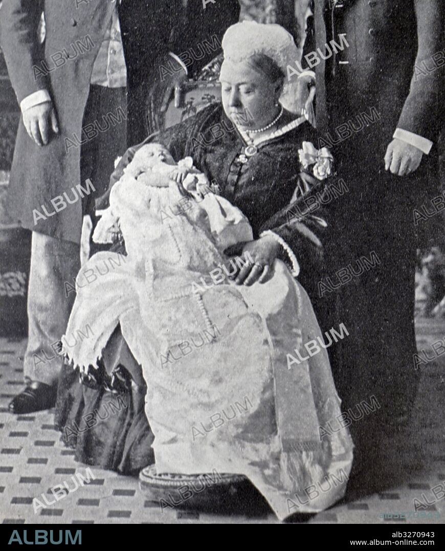 Photograph of Queen Victoria (1819-1901) with King Edward VII, King George V and great-grandson Albert Edward. Dated 20th Century.