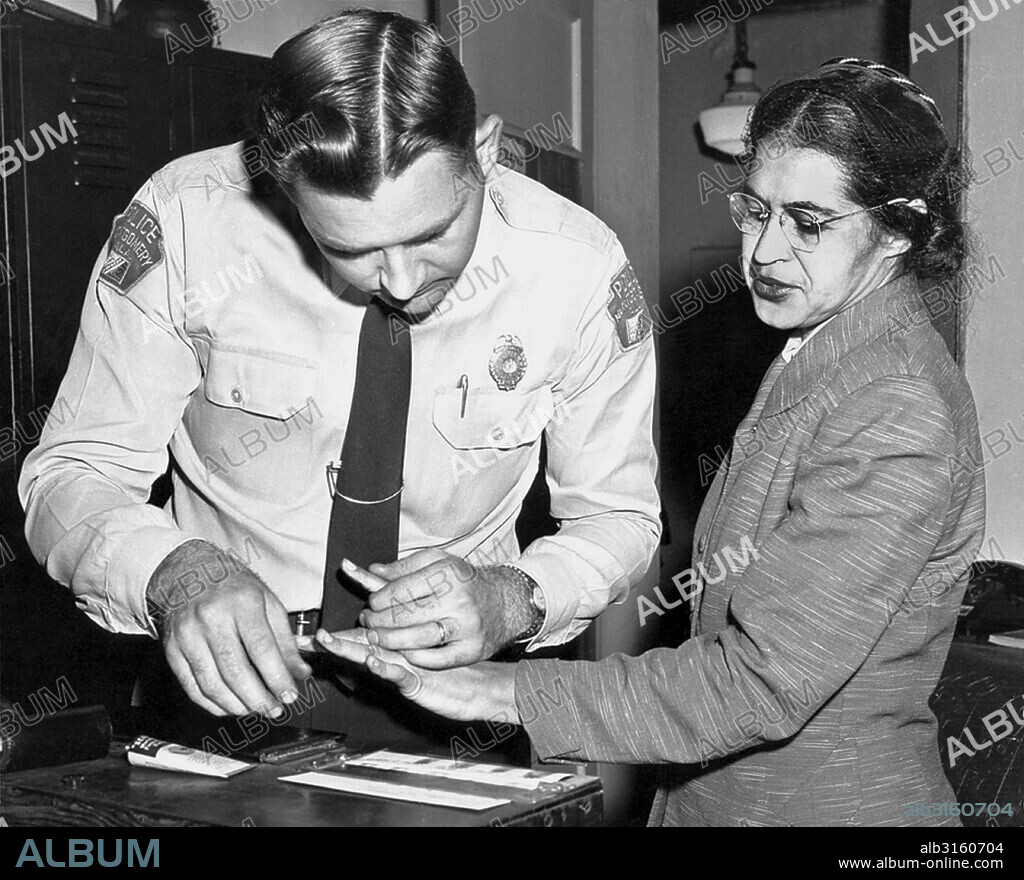 Montgomery, Alabama: 1956. Mrs. Rosa Parks, a Negro seamstress, being fingerprinted after her refusal to move to the back of a bus to accomodate a white passenger touched off the bus boycott in Montgomery, Ala. (Photo by Underwood Archives/Getty Images).