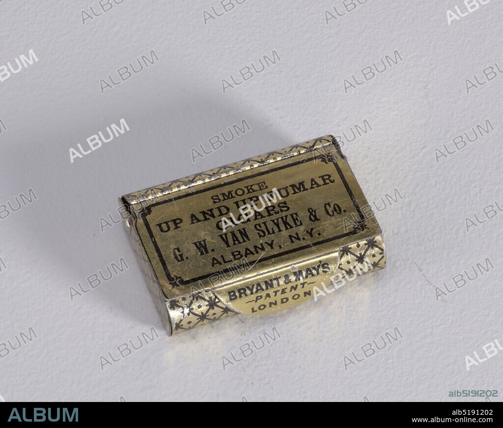 'Smoke Up & Up Fumar Cigars', Huntley, Boorne, & Stevens, Plated tin, printed gilded, Rectangular, curved sides, snuff box style container, featuring black printed decoration on gold ground, cover inscribed 'Smoke Up and Up Fumar Cigars, G.W. Van Slyke & Co., Albany, N.Y.', inscribed on thumb catch to right 'Bryant & May's, Patent, London' , diamond, star and dot pattern on rest of box body. Striker on reverse., 187080, containers, Decorative Arts, Matchsafe, Matchsafe.
