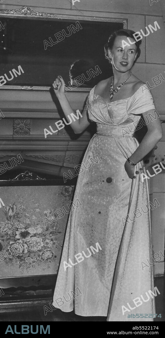 Mrs. Frank Mills the former Elaine Walker Smith, of Sydney and San Francisco, who married Dr. Frank Mills, of Darling Point, at St. Mark's Church on Monday 9am.Town and Country Ball -- Elayne Walker Smith (right) were this coin-spotted pink satin brocade dress to the Town and Country Ball at Glen Ascham last night.More than 250 were received by the committee president, Mrs. Clinton Ayers.Mr. and Mrs. Ayers guests included Mr. and Mrs. Keith Mazoudier, of Trundle, and Mr. and Mrs. Bill Nickolls, of West Australia.Special Chinese dishes were served for supper, held buffet-style on the floodlit terrace.Smith Family Appeal Committee country vice-president Mrs. Bill Macphillamy came down from Bathurst with her husband for the ball. April 12, 1953.
