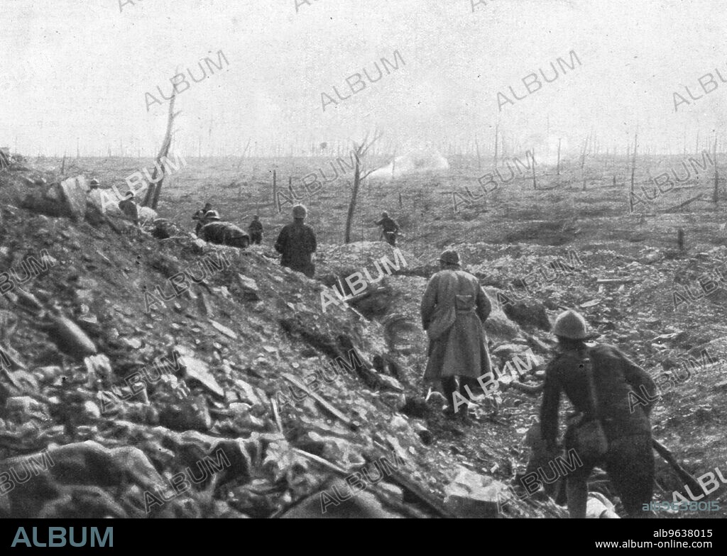 'La victoire de Douaumont; un coup de main, le 22 octobre, dans le ravin des Fontaines d'ou allait partir, le surlendemain, l'attaque la direction de Vaux : deux Allemands sortent de leurs trous a la vue de nos premiers grenadiers et se rendent : toute une section de vingt-cinq hommes en fit autant.', 1916. From "Collection de la Guerre IV. L'Illustration Tome CXLVII. La Guerre Juillet, Aout, Septembre, Octobre, Novembre, Decembre 1916".