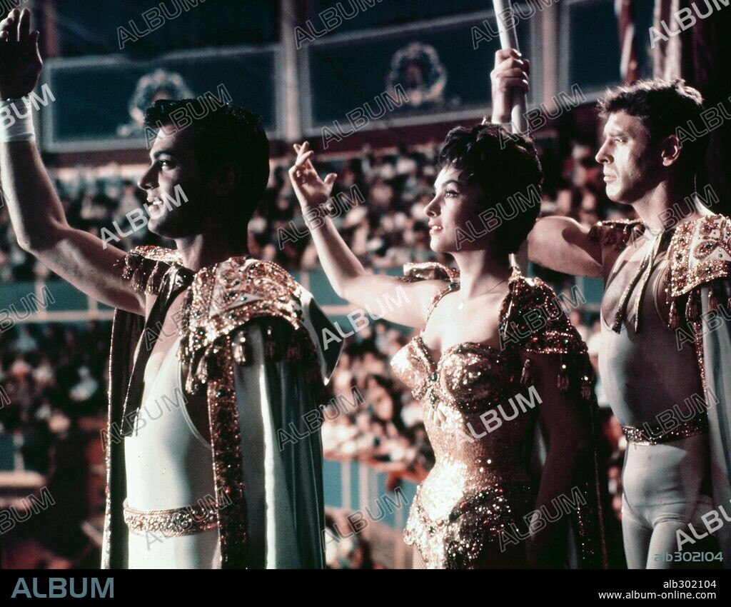 BURT LANCASTER, GINA LOLLOBRIGIDA and TONY CURTIS in TRAPEZE, 1956, directed by CAROL REED. Copyright UNITED ARTISTS.