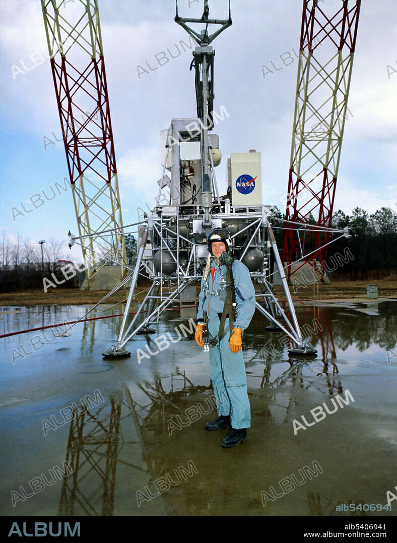 Neil Armstrong, shown here with NASA Langley Research Centers Lunar Excursion Module (LEM) Simulator in May of 1969. Training with the simulator, part of Langleys Lunar Research Facility, allowed the Apollo astronauts to study and safely overcome problems that could have occurred during the final 150-foot descent to the surface of the moon. NASA needed such a facility in order to explore and develop techniques for landing the LEM on the moons surface, where gravity is only one-sixth as strong as on the Earth, as well as to determine the limits of human piloting capabilities in the new surroundings. This unique facility, completed in 1965 and now a National Historic Landmark, effectively canceled all but one-sixth of Earths gravitational force by using an overhead cable system.